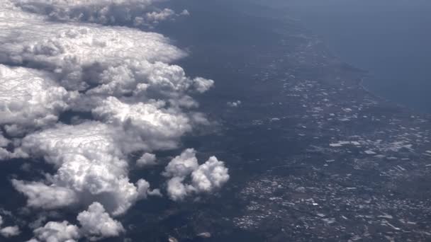 Flying Clouds View Ground Sea Moving Airplane — Vídeos de Stock