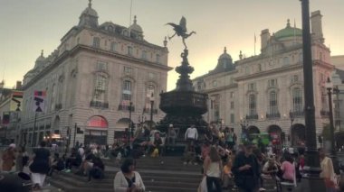 Piccadilly circus square in London at the evening, tourism spot and ads, United Kingdom, 10.08.2022