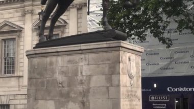 George Duke of Cambridge statue on Trafalgar square London street view landmarks and tourists, 4k cinematic