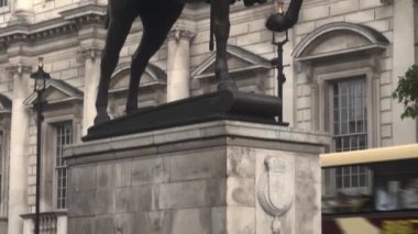 George Duke of Cambridge statue on Trafalgar square London street view landmarks and tourists, 4k cinematic