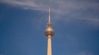 Alexanderplatz tower hyperlapse time lapse over blue sky, Germany