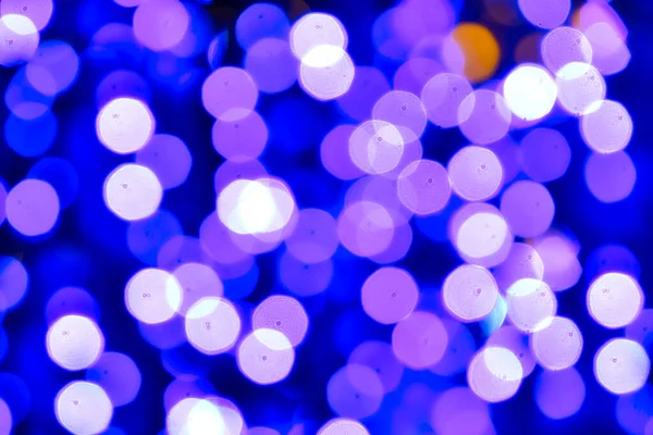 Renkli ışıklarla dolu bir Noel arkaplanı.