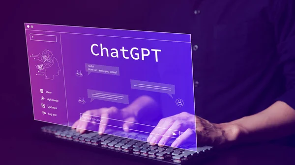 ChatGPT, Yapay Zeka veya Yapay Zeka teknolojisiyle sohbet. Akıllı bir yapay zekayla sohbet eden dizüstü bilgisayar kullanan bir adam istediği cevapları ister. Akıllı yardımcı fütürist,