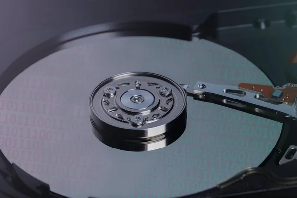 stock image Backup data, database recovery, security data, and device repair service, Inside of internal Hard Drive HDD. dismantle from the computer. number binary digital on disc.