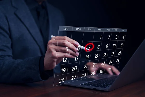 Calendar agenda Appointment meeting Schedule Concept. Businessman using pen to writing circle red mark on virtual calendar. Manage time for effective work. Time management, Planning Organizer,