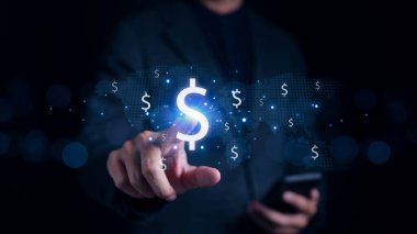 Merkez bankacılık ve uluslararası para birimi kavramı. Dünya haritalı ABD Doları (USD) para sembolüne dokunan iş adamı eli. Para değişimi ve para transferi ödemesi, Dünya Bankası,