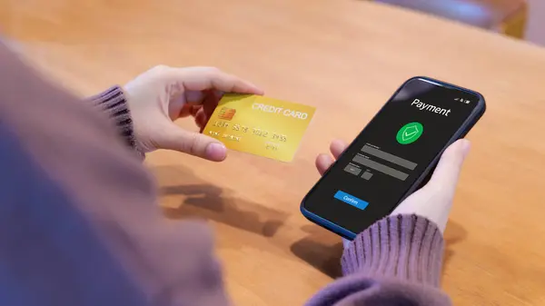 Online Payment Concept. Woman using phone with credit card shopping and payment via mobile banking apps. making a purchase online, electronic payment system, digital bank, Internet money transaction,