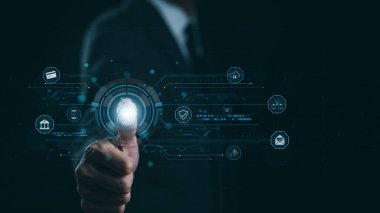 Siber güvenlik kavramı. İş adamı parmak izini taramak ya da internet bankacılığı, bulut bilgisayarı, büyük veriler de dahil olmak üzere güvenlik sistemine erişmek için biyometrik tanımlama için başparmağını kullanıyor,