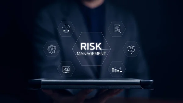 Businessman showing risk management icons. Risk analysis in Business or finance and assessment for business investment. Forecasting evaluation financial, Strategy plan control, Enterprise manage,