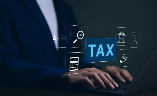 Tax concept. Businessman using laptop to complete individual income tax return form online for tax payment. Value added tax (VAT), Government state taxes, Calculation tax return, Money and financial,