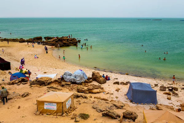 stock image Dkhala, Morocco - 20 June 2022 : People having fun in a tropical beach in Dakhla in Morocco