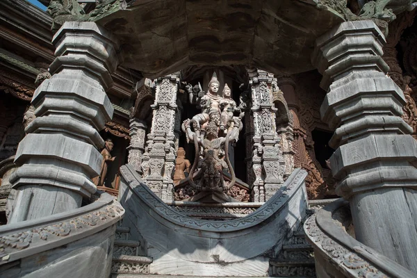 stock image Sanctuary of Truth - an ancient wooden temple in Pattaya, highly detailed wood carving, dramatic lighting during sunset hours.