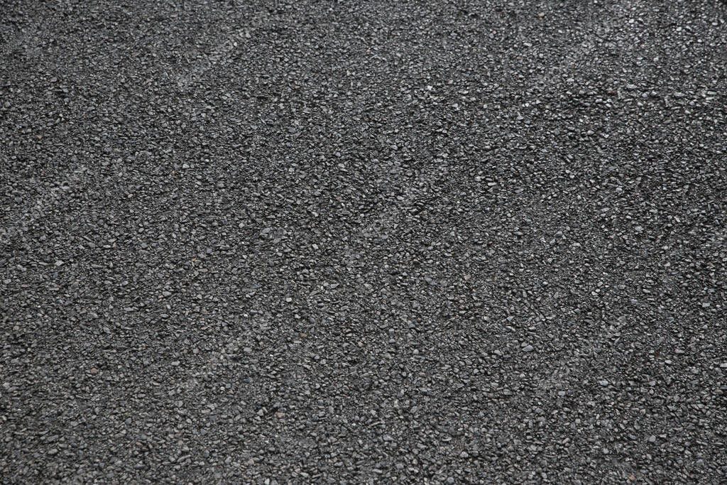 Neutral grey asphalt texture background, rough grainy surface