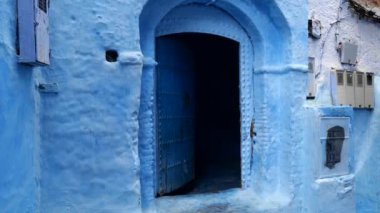 Etkilenen turist kasabası Sosyal medya arka planı Turistik egzotik Mavi Kasaba Ünlü Mavi Şehir