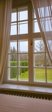 Beatiful vintage cozy carpets and window view