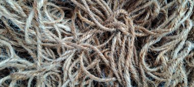 Keten iplik ipi ve iplik dokusu arka planı. Keten kumaş üretimi için keten iplikler, keten ipliği ve iplik deseni