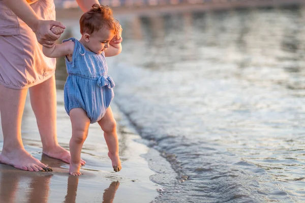 Little Baby Girl Walking Beach Mother Support First Steps Summer Stockbild