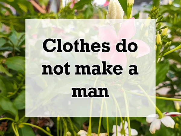 Μια Αγγλική Παροιμία Απόσπασμα Κειμένου Φόντο Ρούχα Δεν Κάνουν Έναν — Φωτογραφία Αρχείου