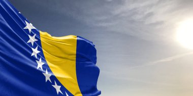 Bosna-Hersek ulusal bayrak kumaşı güzel gri arka planda dalgalanıyor.