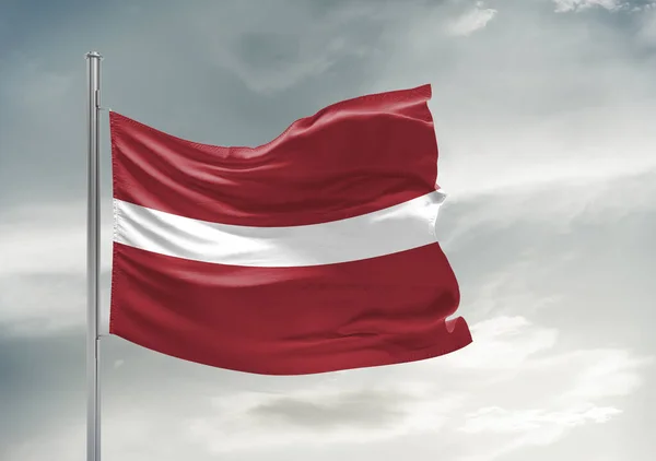Letonia Tela Bandera Nacional Ondeando Sobre Hermoso Cielo Gris Fondo —  Fotos de Stock