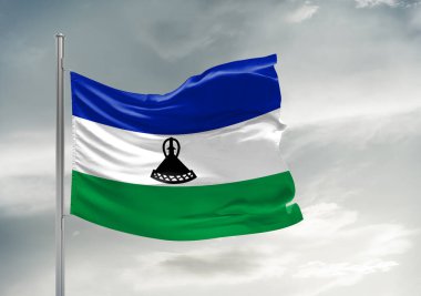 Lesotho Ulusal Bayrak Kumaşı Güzel gri arka planda sallanıyor.