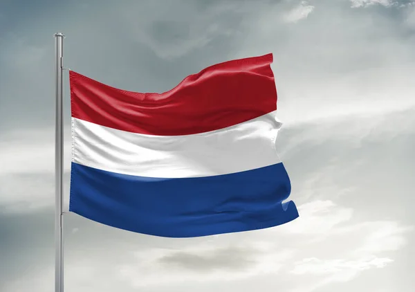 Netherlands National Flag Cloth Fabric Waving Beautiful Grey Sky Background — Stock Photo, Image