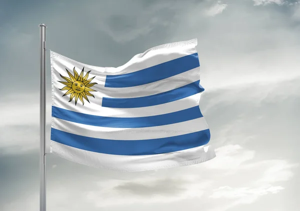 Uruguai Tecido Pano Bandeira Nacional Acenando Céu Cinza Bonito Fundo — Fotografia de Stock