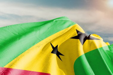 Sao Tome ve Principe Ulusal Bayrak Kumaşı Güzel gri arka planda sallanıyor.
