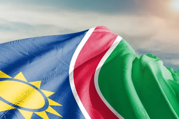 Namibië Nationale Vlag Stof Zwaaien Mooie Grijze Achtergrond — Stockfoto