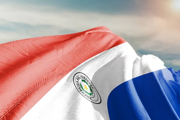 美しい灰色の上に手を振るパラグアイ国旗布生地背景 — ストック写真