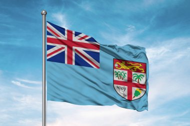 Fiji Ulusal Bayrak Kumaşı Güzel Bulutlu Arkaplanda Dalgalanıyor.
