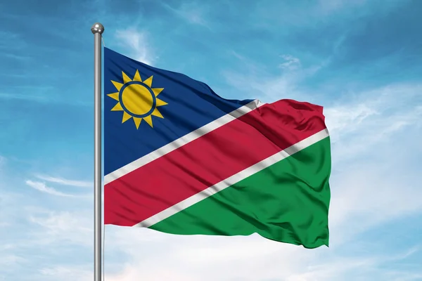 Namibië Nationale Vlag Doek Zwaaiend Mooie Bewolkte Achtergrond — Stockfoto