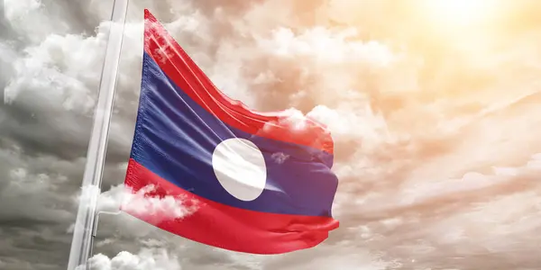Laos Nationalflagge Stoff Weht Auf Schönen Grauen Hintergrund — Stockfoto