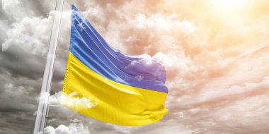 Gri arka planda sallanan Ukrayna ulusal bayrak kumaşı.