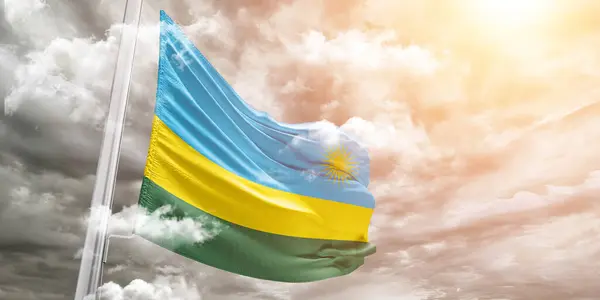 stock image Rwanda national flag cloth fabric waving on beautiful grey Background.