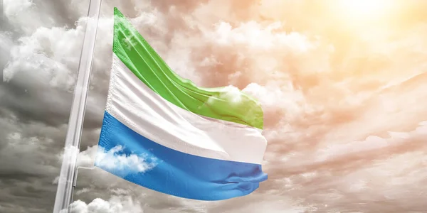 Sierra Leone Stoffa Bandiera Nazionale Tessuto Sventolando Sul Bellissimo Sfondo — Foto Stock