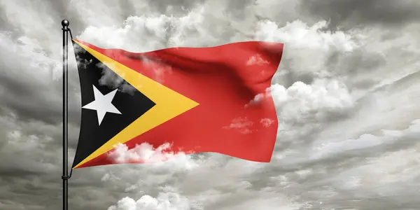 stock image East Timor (Timor-Leste). national flag cloth fabric waving on beautiful Cloudy Background.