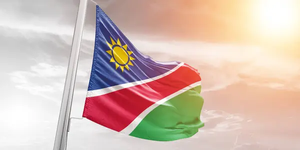 Tecido Pano Bandeira Nacional Namíbia Acenando Belo Fundo Nublado — Fotografia de Stock