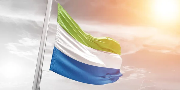 Sierra Leone National Flag Cloth Fabric Waving Beautiful Cloudy Background — Stock Photo, Image