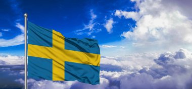 İsveç ulusal bayrak kumaşı güzel bir arka planda dalgalanıyor.