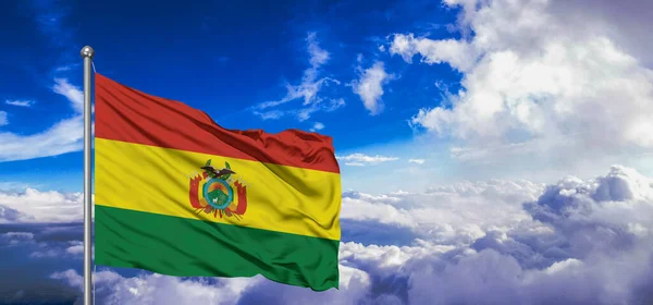 stock image Bolivia national flag cloth fabric waving on beautiful cloud Background.