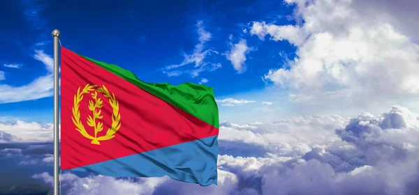 stock image Eritrea national flag cloth fabric waving on beautiful sky Background.