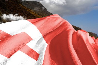 Tonga Ulusal Bayrak Kumaşı Güzel Dağ Arkaplanı 'nda sallanıyor.