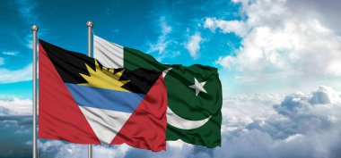 Pakistan ve Antigua 'nın bayrakları ve Barbuda dostluk bayrağı güzel gökyüzünde dalgalanıyor..