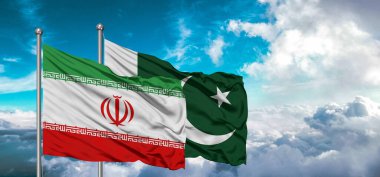 Pakistan ve İran 'ın bayrakları gökyüzünde güzel bir gökyüzü dalgalandırıyor..