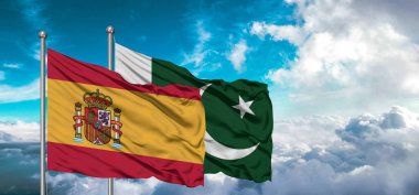 Pakistan ve İspanya 'nın bayrakları gökyüzünde dalgalanan dostluk bayrağı.