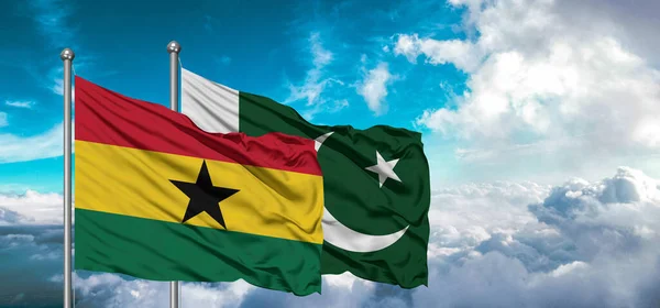 stock image Flags of Pakistan and Ghana friendship flag waving on the sky with beautiful sky.