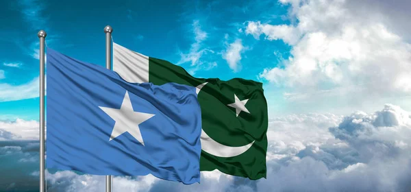 パキスタンとソマリアの友情の旗が空に美しい空を振って — ストック写真