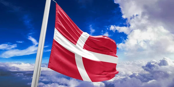 stock image Denmark national flag cloth fabric waving on beautiful sky Background.