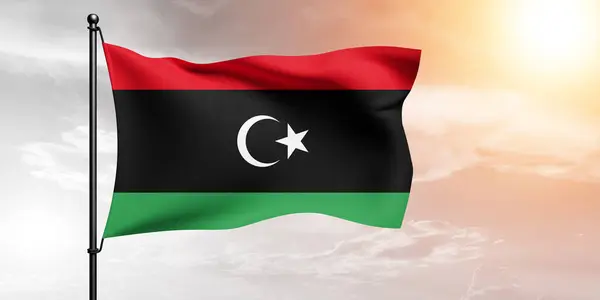 stock image Libya national flag cloth fabric waving on beautiful sky Background.